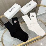 Two pairs of Moncler socks (one box includes packaging). These super popular Mon