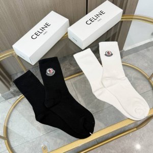 Two pairs of Moncler socks (one box includes packaging). These super popular Mon