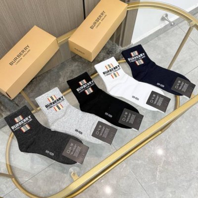 A box of five pairs of Burberry mid-calf socks, including packaging. These are t