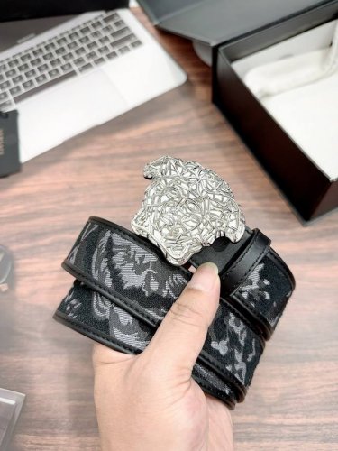 Versace's jacquard belt features a Barocco print and the iconic La Medusa buckle