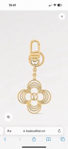 Lv Breeze Keychain Bag Charm. This keychain features a delicate floral design, e