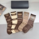 5 pairs of Ugg trendy high-quality long socks per box, including packaging. A m