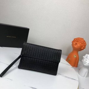 , the Bv casual clutch with a matching box, is made of imported waxed cowhide. I