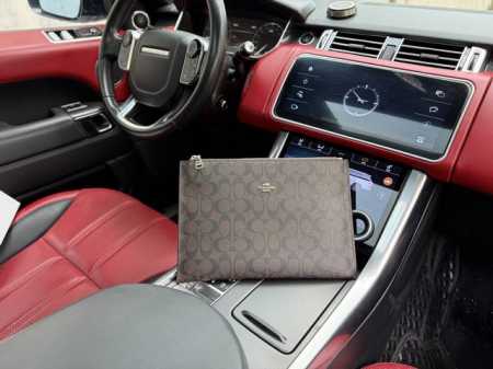 High-end new "Coach" clutch. Coach men's clutch featuring classic monogram prin - Click Image to Close