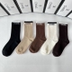 Specially packaged Chanel new mid-calf slouch socks! Five pairs per box, same st