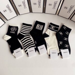 Specially packaged in Chanel's new mid-length stacked socks! Five pairs per box,