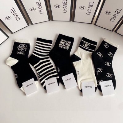 Specially packaged in Chanel's new mid-length stacked socks! Five pairs per box,