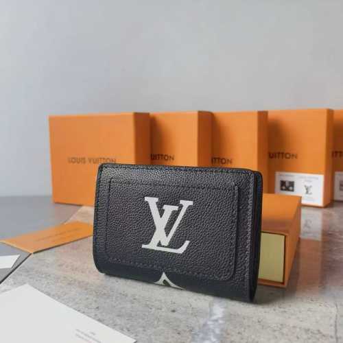 Colors: Black, White, and Gray Size: 11 x 8.5 The "Portefeuille Claire" has bee