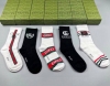 Gucci's new high-top socks, five pairs per box. The classic double G logo adds
