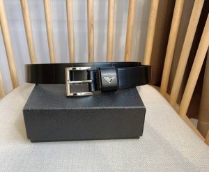 Prada: This latest Prada belt is crafted from exquisite glossy leather, present