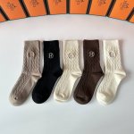 Specially packaged Hermes cashmere embroidered mid-calf socks! Five pairs per bo