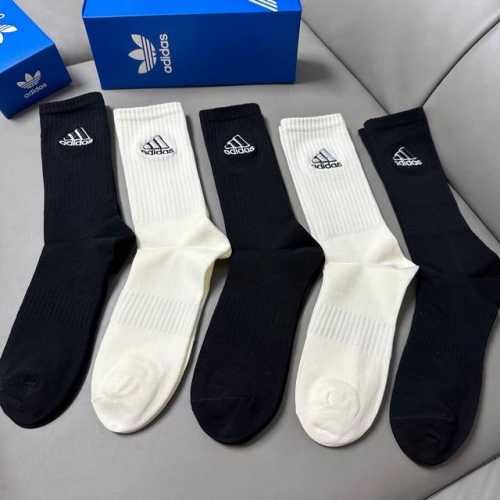 Special Adidas new women's knee-high socks, featuring the wildly popular trefoil