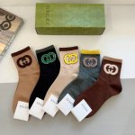 comes with a box of 5 pairs of Gucci's new mid-calf socks! Pure cotton fabric,