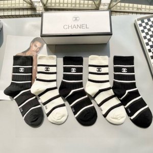 A box of five Chanel mid-calf socks with packaging