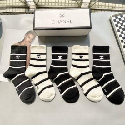 A box of five Chanel mid-calf socks with packaging