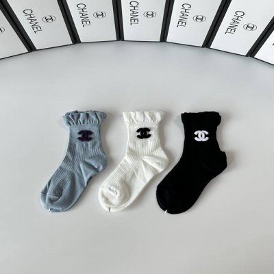 Specially packaged Chanel new style slouch socks! Three pairs per box, same styl