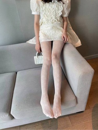 One box contains one pair of Louis Vuitton lettered fishnet stockings/pantyhose,