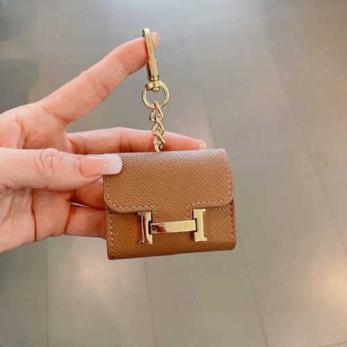 Hermes official website 1:1 earphone bag Palm pattern leather metal logo Fashio