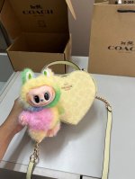 with Labubu pendant Coach Heart Bag Classic vision of the future Fashionable an