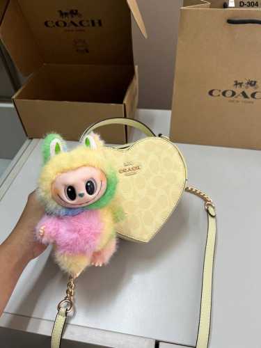 with Labubu pendant Coach Heart Bag Classic vision of the future Fashionable an