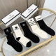 A box of five Chanel cashmere knee-high socks, high-quality replica, comes with