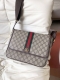 Gucci* new crossbody bag. The elegant combination of top-grain cowhide and Gucci