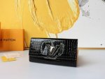 Color: Black Size: 20X11M99002 The Capucines wallet is crafted from luxurious c