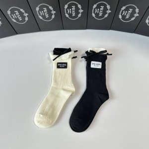 Special packaging for Prada's new cashmere slouch socks! Two pairs per box, same