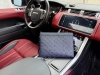 A new high-end Louis Vuitton Pochette To-Go clutch with a branded logo and zippe