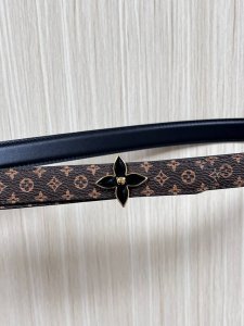 2.0 wide canvas with white floral print, black calfskin with a bulge, a point an