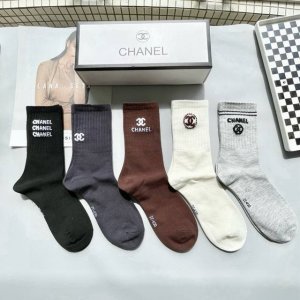 A box of five Chanel high socks, including packaging. High-quality replica of Ch