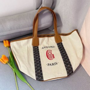 Goyar's elegant, reversible shopping bag is perfect for this summer, brimming wi