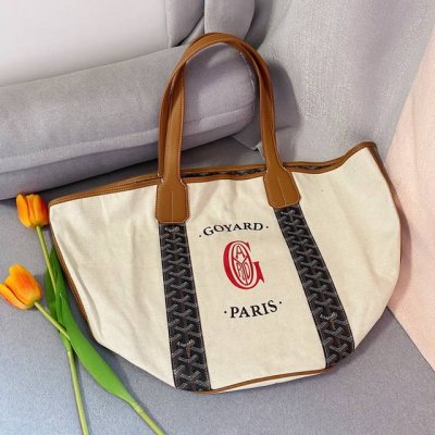 Goyar's elegant, reversible shopping bag is perfect for this summer, brimming wi