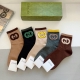 comes with a box of 5 pairs of Gucci's new mid-calf socks! Pure cotton fabric,