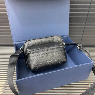 Dior embossed cowhide Rider 2.0 with adjustable shoulder strap and zipper closur