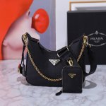 Returned stock! 1Bh204, a new all-leather Nylon Hobo handbag with gold hardware