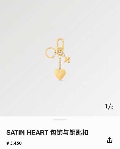 Lv bag charms and keychain bag pendants The Lv Heart bag charm is made of dazzli