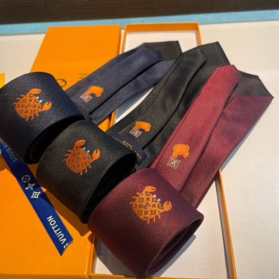 Lv Crab Silk tie is dyed in deep tones and features the iconic Monogram pattern
