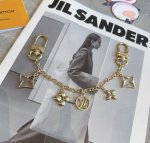 Lv keychain bag chain pendant gold M01188 Spring Street Chain bag decoration tur