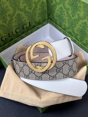 Features the brand's iconic double-G monogram pattern in a beige-ebony color co