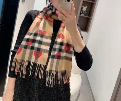 Burberry heart-shaped scarf is a year-round staple, a must-have in any wardrobe,