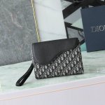 This A5 triangular clutch is a new Dior staple. Crafted from beige and black Obl