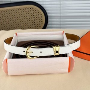 Swift Calfskin Belt With A Metal Buckle. This Belt Features A Sleek, Rounded Den