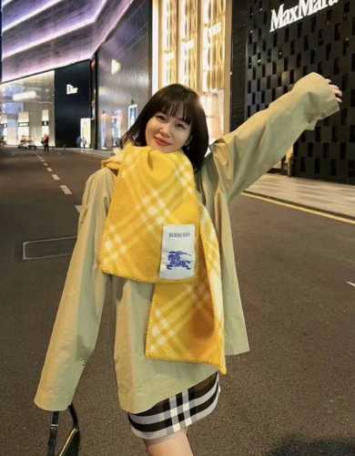 Understated luxury, exquisite femininity, and a stylish, elite-level scarf. This