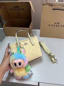 with Labubu pendant Coach cream yellow vegetable basket Cream yellow is popular
