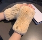 Chanel 2025 Fall/Winter Sloth Rabbit Fur Fingerless Cropped Gloves - A must-have
