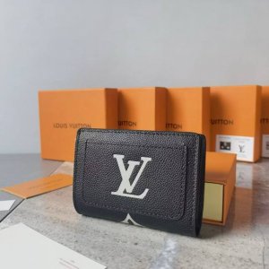 Colors: Black, White, and Gray Size: 11 x 8.5 The "Portefeuille Claire" has bee