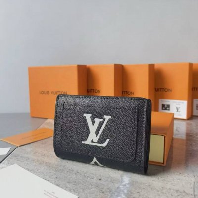 Colors: Black, White, and Gray Size: 11 x 8.5 The "Portefeuille Claire" has bee