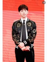 Silk tie with gold bee embroidery, a motif that has quickly become one of the mo