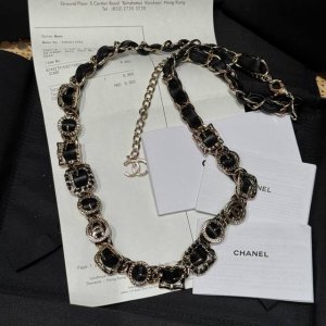 Chanel's new waist chain features classic Chanel black and gold, interwoven cha